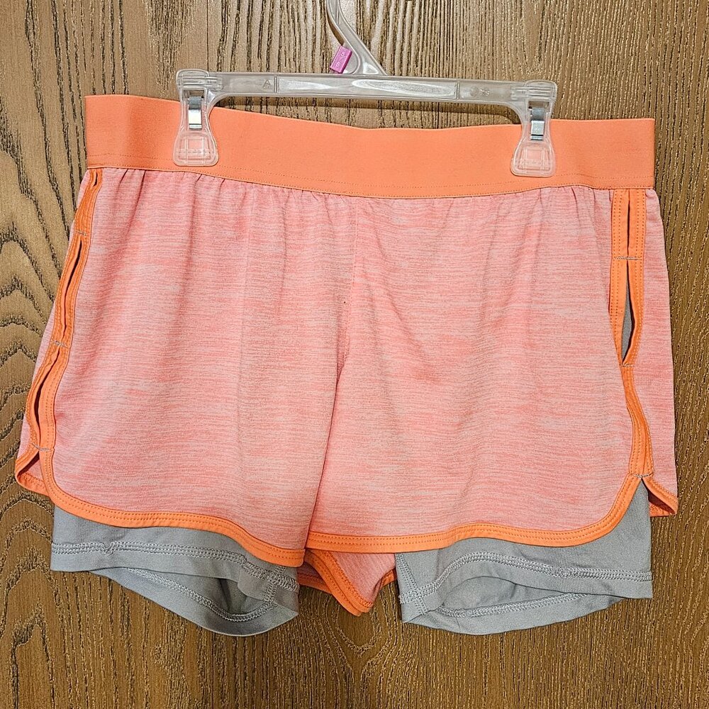 Danskin Now workout shorts size S. Peach and gray.